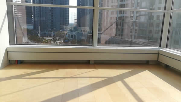 上海前滩(幕墙前进上出型自然对流铜管铝翅片包围一体式散热器)安装案例